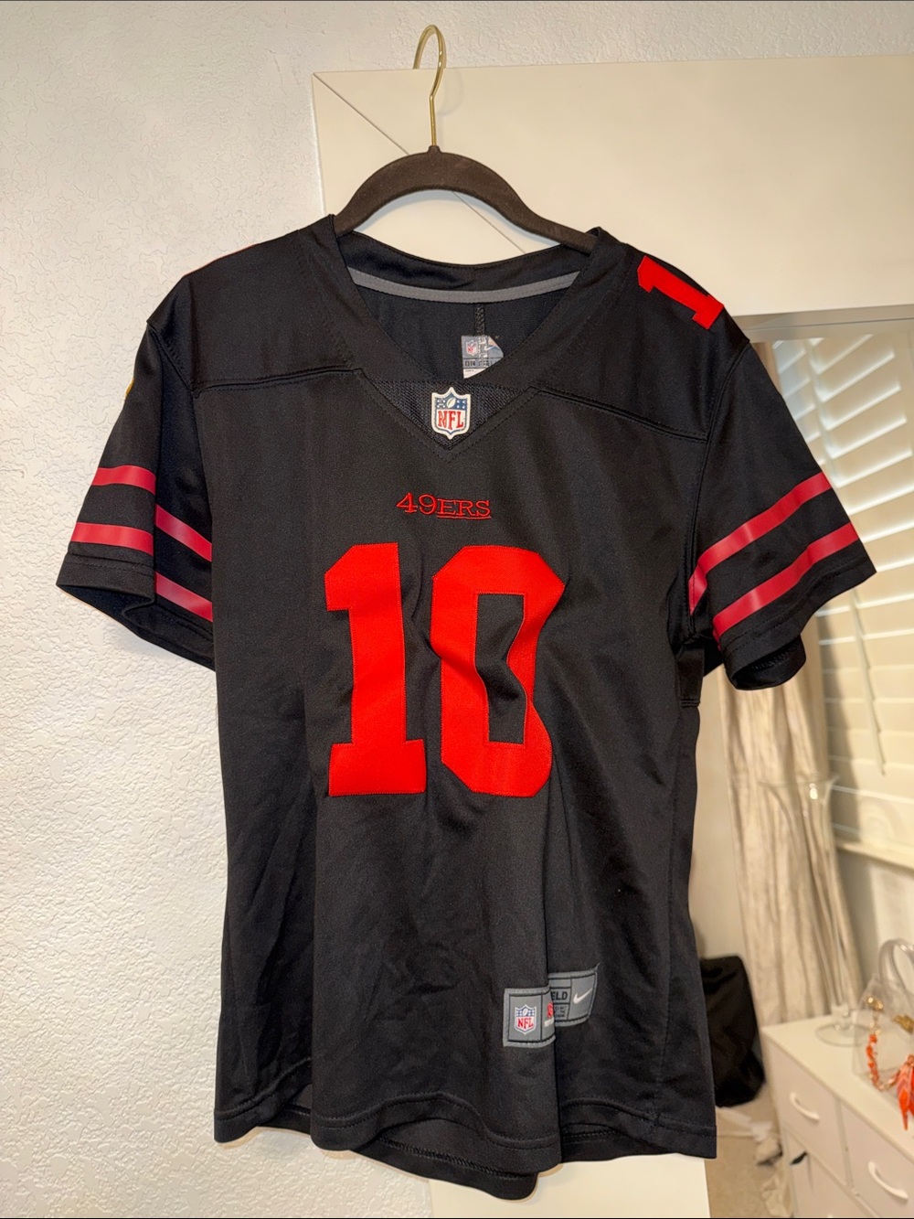NFL Nike womenβs 10 Black and Red 49ers Jersey Top -Garoppolo